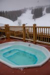 Communal hot tub with amazing views of the mountain. Perfect for soothing aches